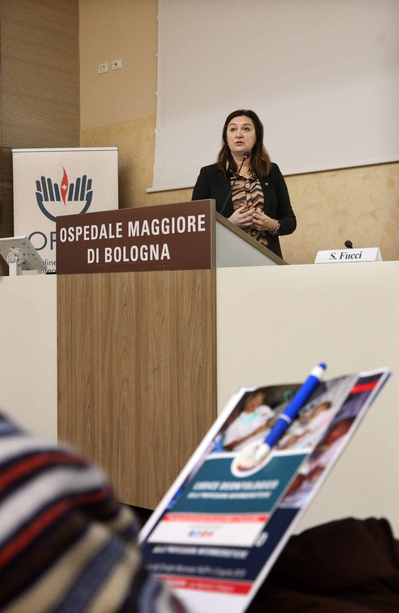 Bologna, 9/11/2019. Aula Magna dellOspedale Maggiore di Bologna. un seminario per conoscere il nuovo Codice Deontologico degli Infermieri. Tra i relatori Barbara Mangiacavalli (Presidente Nazionale FNOPI), Pio Lattarulo (esperto di etica e di bioetica), Sergio Fucci (Giudice, esperto di bioetica e responsabilità professionale), Silvia Marcadelli (RN, MSN, PhD), Rosaeugenia Pesci (Responsabile Attività didattiche professionalizzanti CdL in Infermieristica UNIBO). In apertura del seminario, la Prof.ssa Carla Faralli, Ordinario di Filosofia del Diritto dellUniversità di Bologna, presenterà il Corso di Alta Formazione in Comunicazione in sanità e Bioetica dellUniversità di Bologna. Fotografie di Paolo Righi